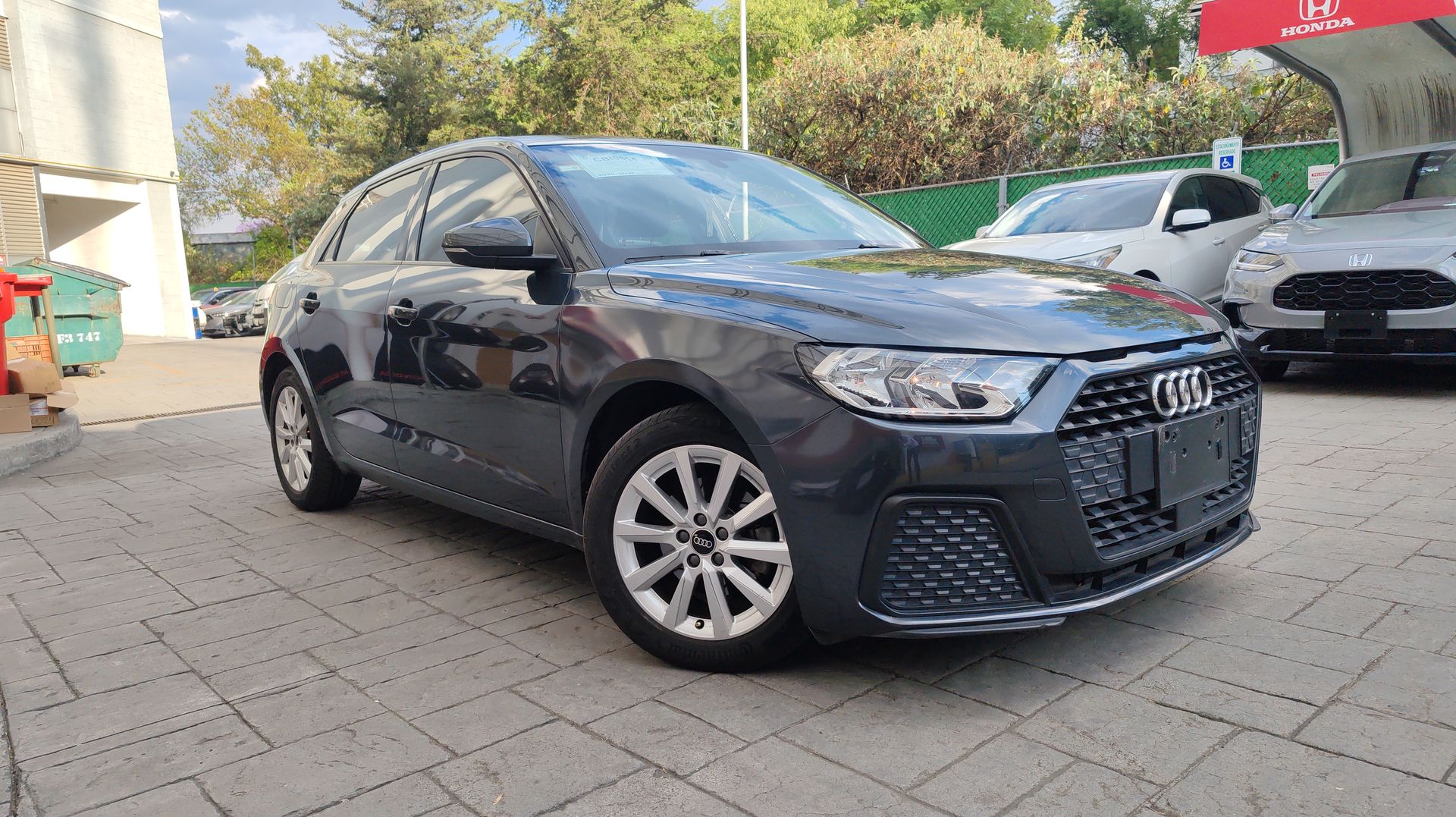 2022 Audi A1 SB 30 TFSI COOL S TRONIC in Gris Manhattan Metalizado — front three-quarter view